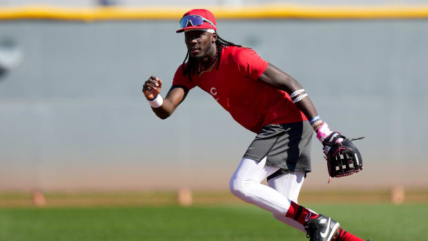 Feb. 14: Reds third baseman Elly De La Cruz tracks a groundball during a spring training workouts. 